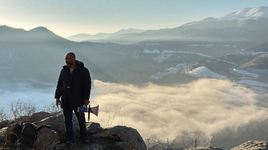 Above the clouds on the mountain set