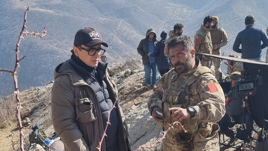 Director and actor discussing a scene