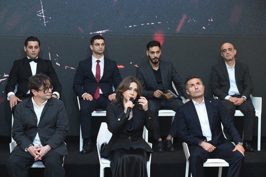 Max Smetana (front row, left) at the press conference