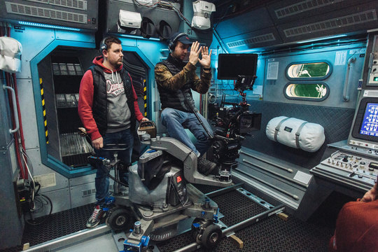 A camera rig inside the ship set